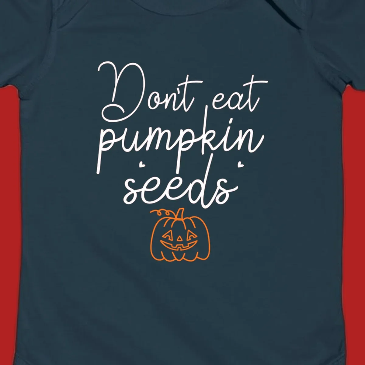 Don't eat pumpkin seeds Halloween text with jack-o-lantern illustration