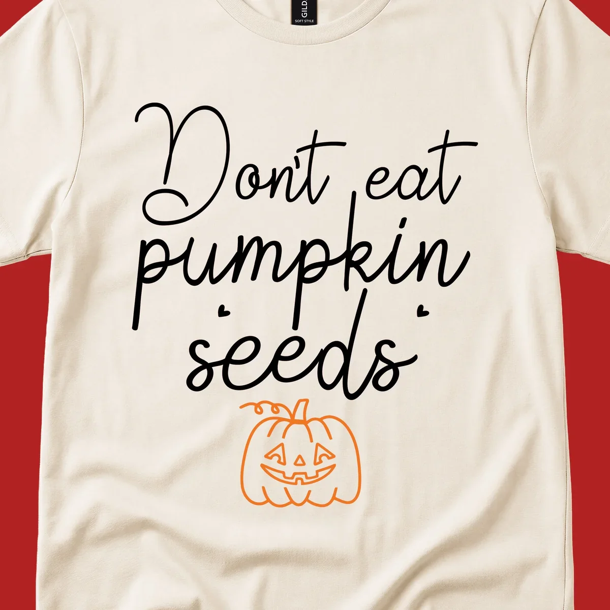 Don't eat pumpkin seeds Halloween text with jack-o-lantern illustration