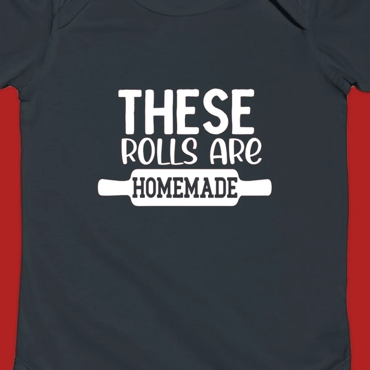 White text 'THESE ROLLS ARE HOMEMADE' with a rolling pin illustration, for homemade rolls baking concept.