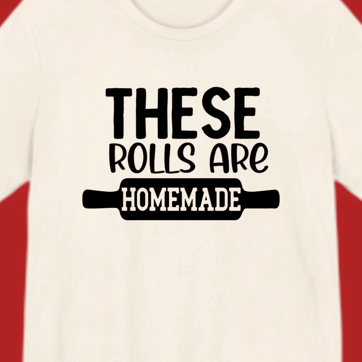 White text 'THESE ROLLS ARE HOMEMADE' with a rolling pin illustration, for homemade rolls baking concept.