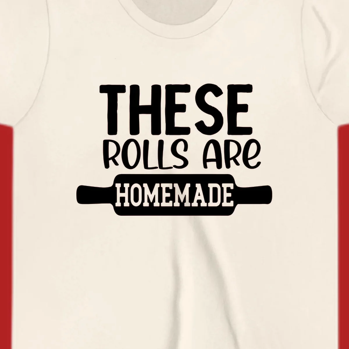 White text 'THESE ROLLS ARE HOMEMADE' with a rolling pin illustration, for homemade rolls baking concept.