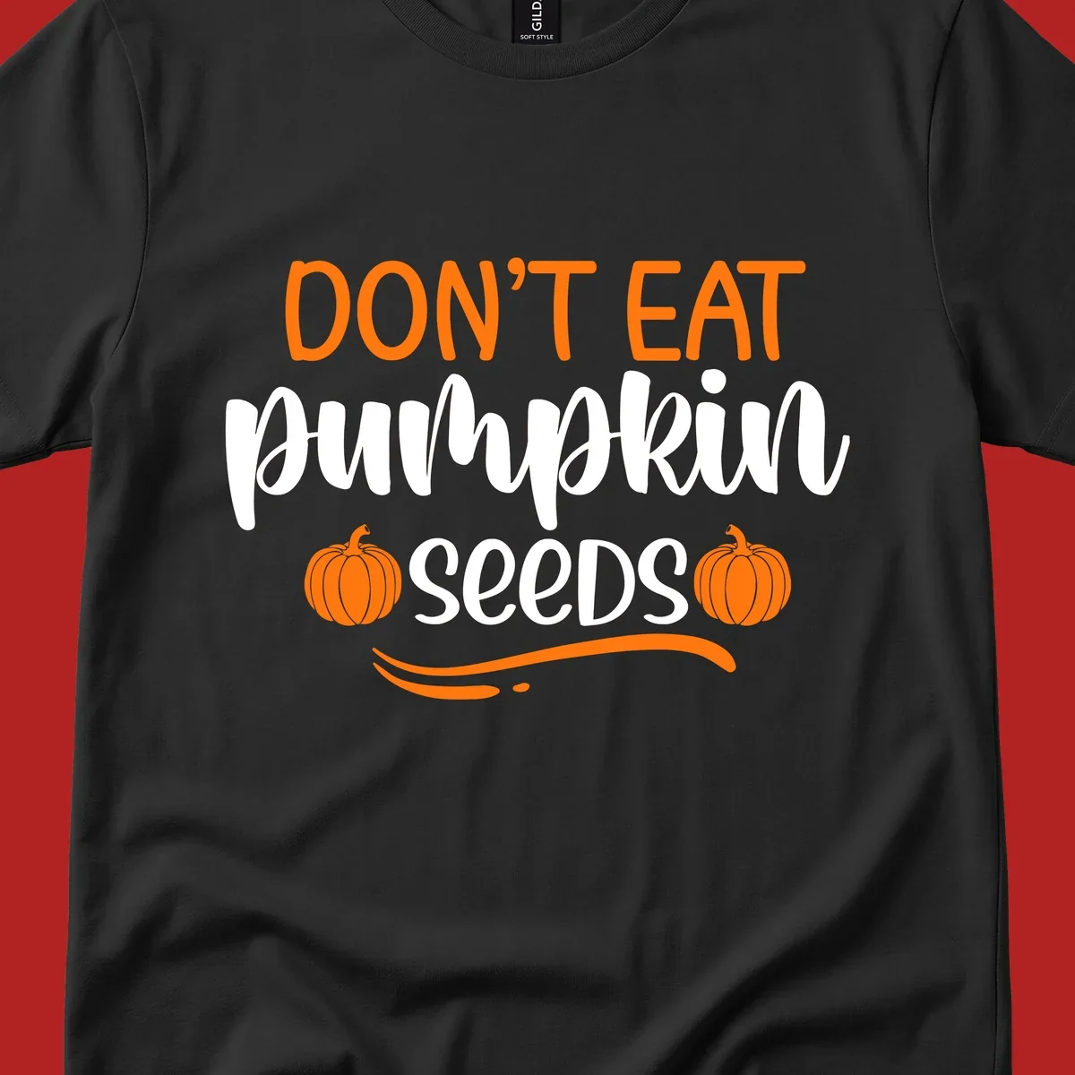 Don't Eat Pumpkin Seeds Fall Saying with pumpkins and swirls