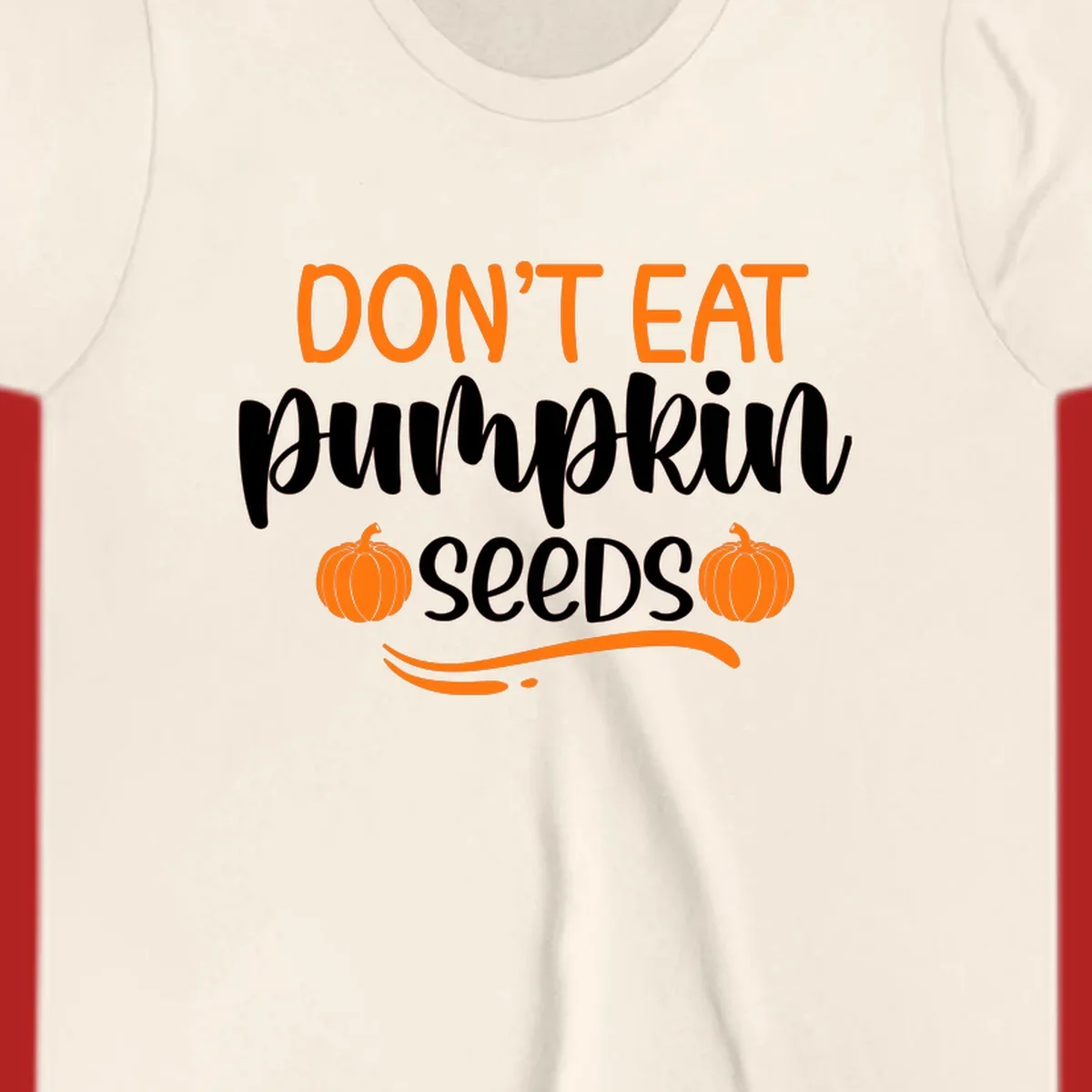 Don't Eat Pumpkin Seeds Fall Saying with pumpkins and swirls