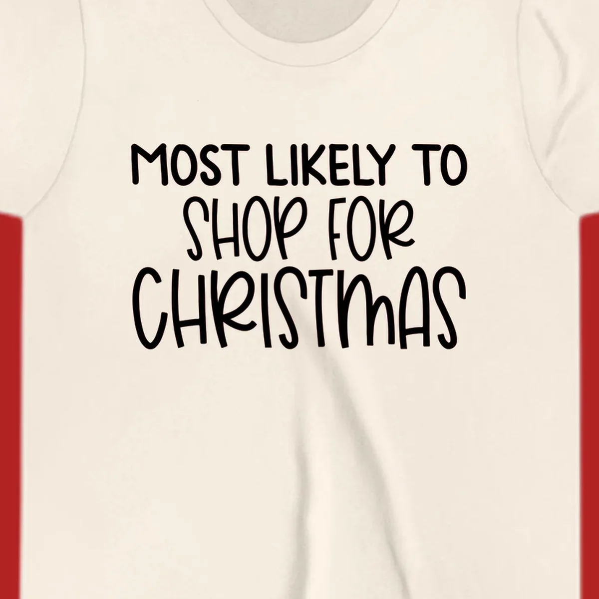 Text design reading 'Most Likely To Shop For Christmas' in white lettering.