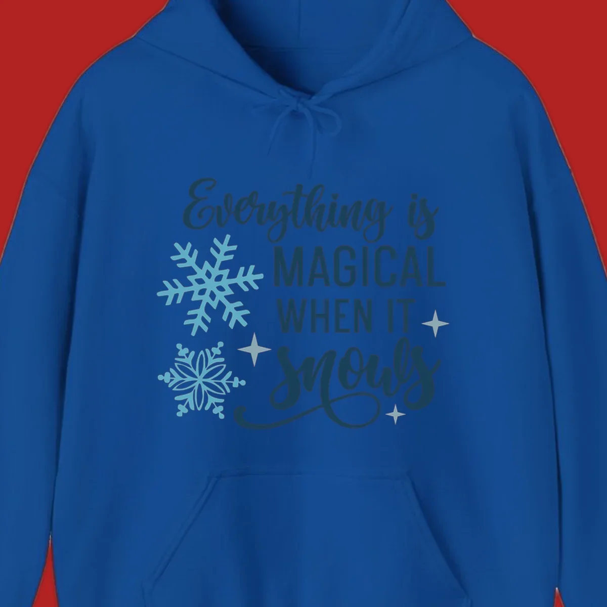 Everything is Magical When It Snows typography with snowflakes and stars.