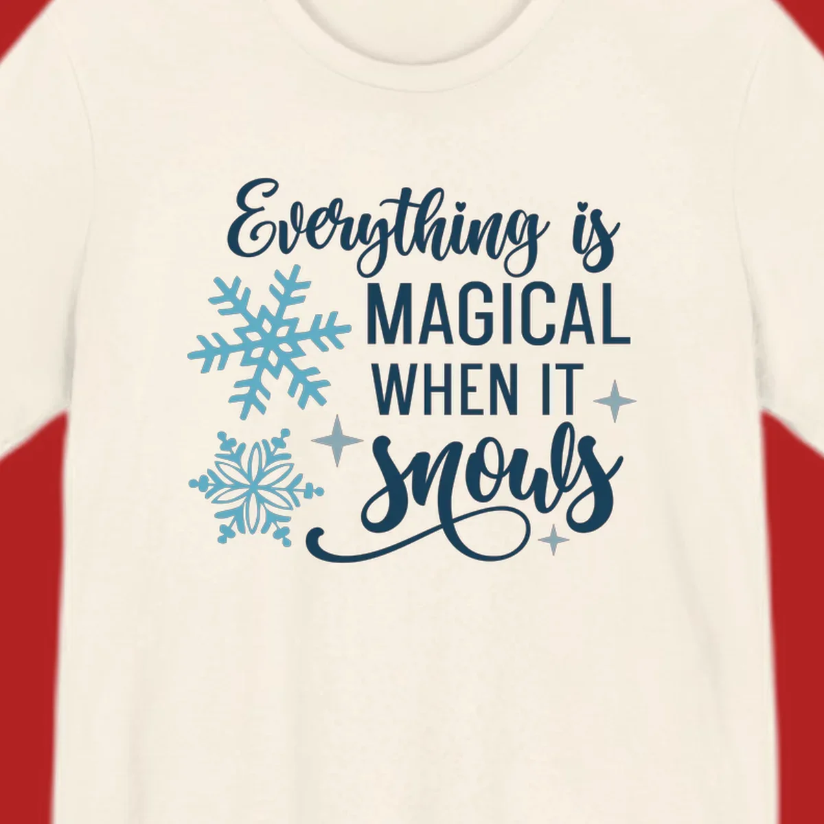 Everything is Magical When It Snows typography with snowflakes and stars.