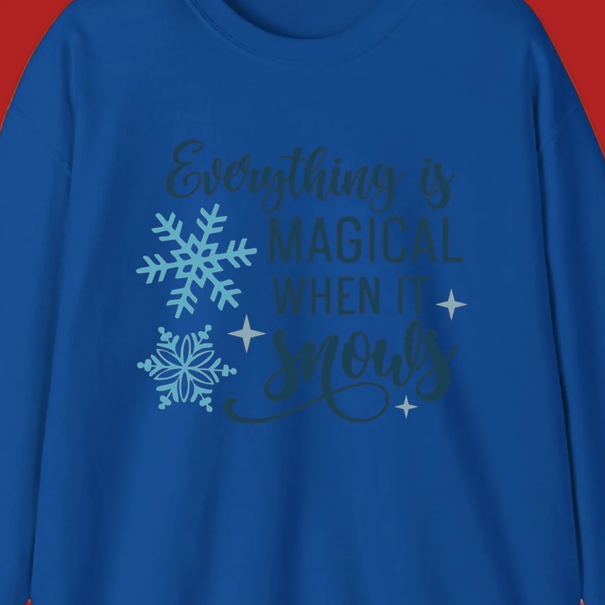 Everything is Magical When It Snows typography with snowflakes and stars.