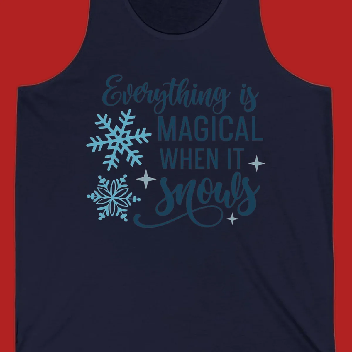 Everything is Magical When It Snows typography with snowflakes and stars.
