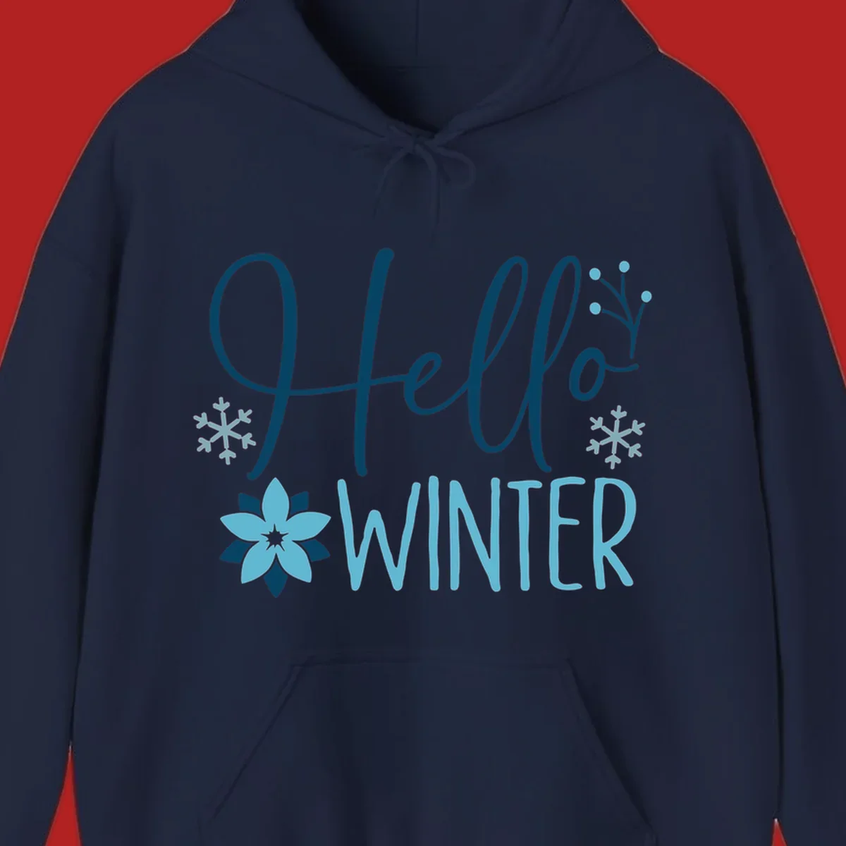 Hello Winter graphic with script text, snowflakes, and winter flower.
