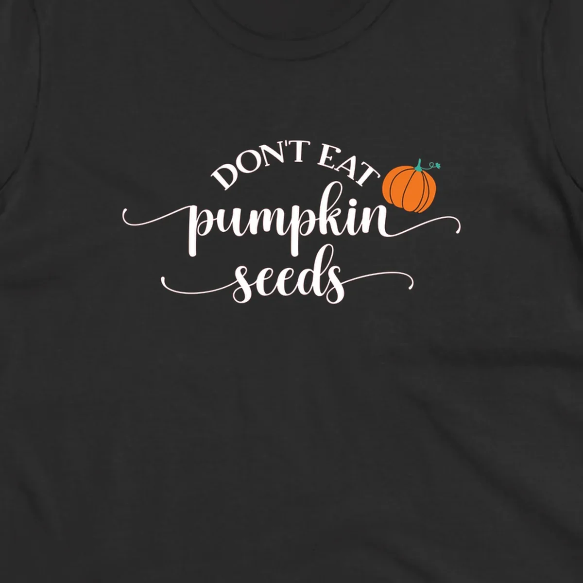 Don't Eat Pumpkin Seeds fall phrase with pumpkin illustration.