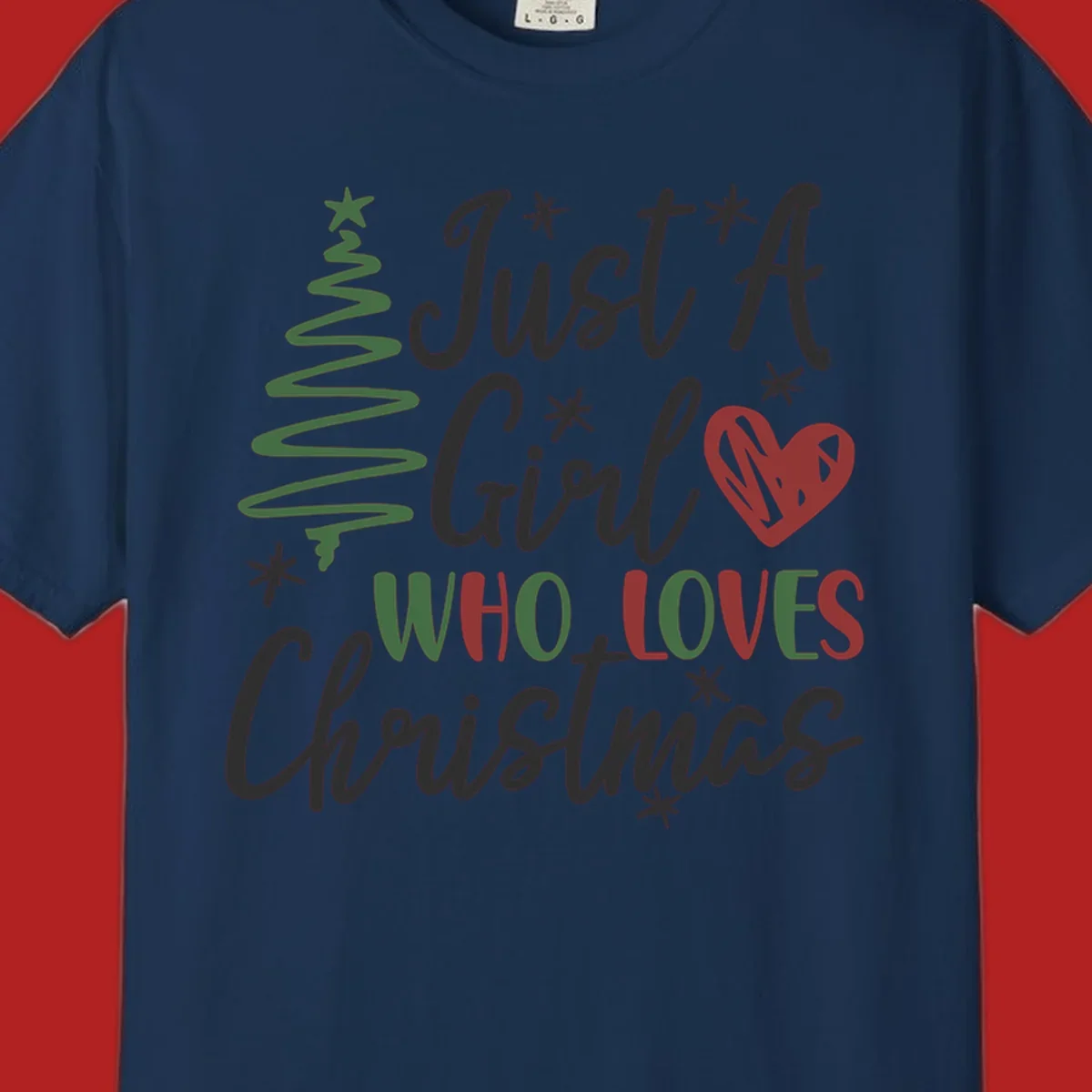 Girl who loves Christmas typography with tree and heart graphic.