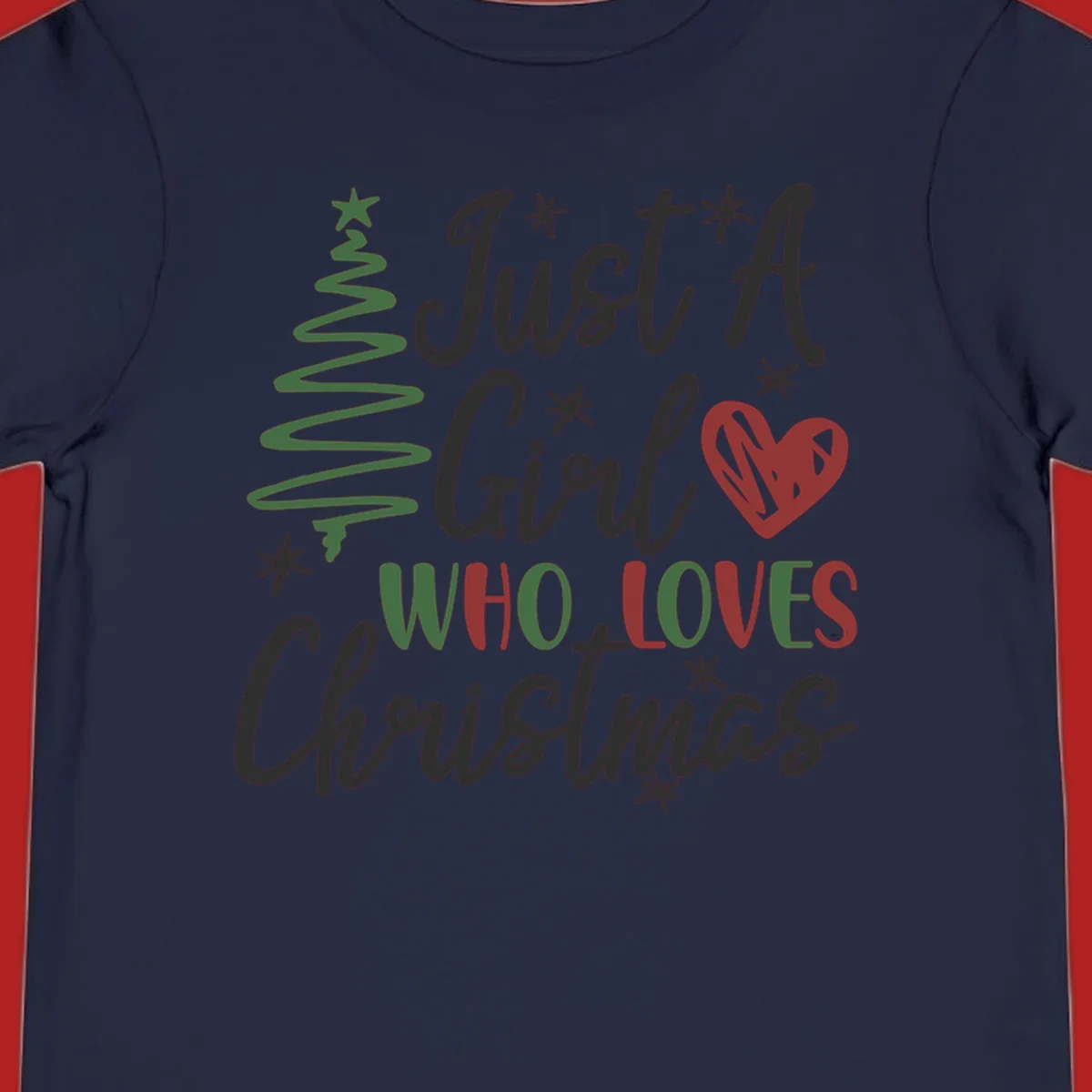 Girl who loves Christmas typography with tree and heart graphic.