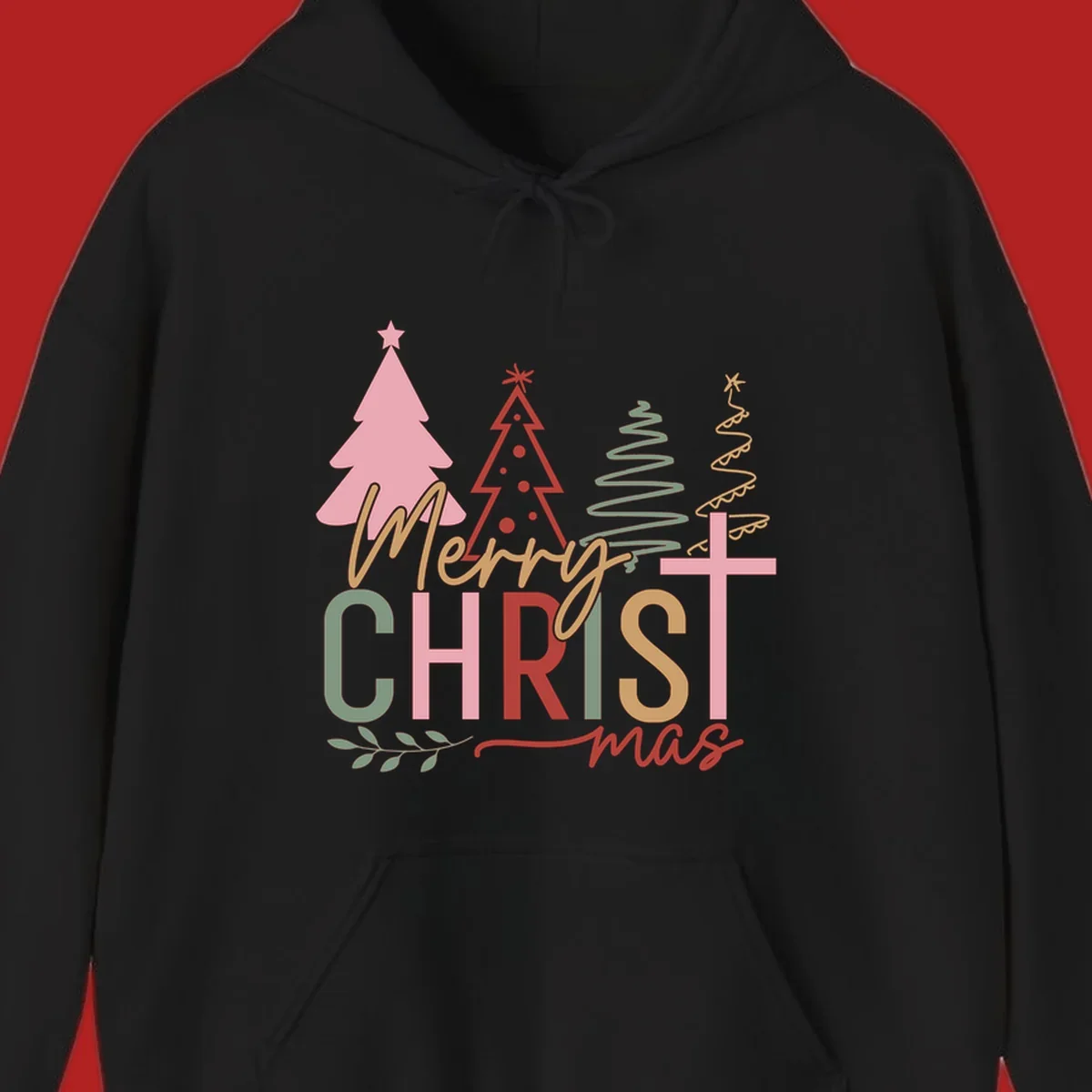Merry Christmas text with stylized trees and a cross design.