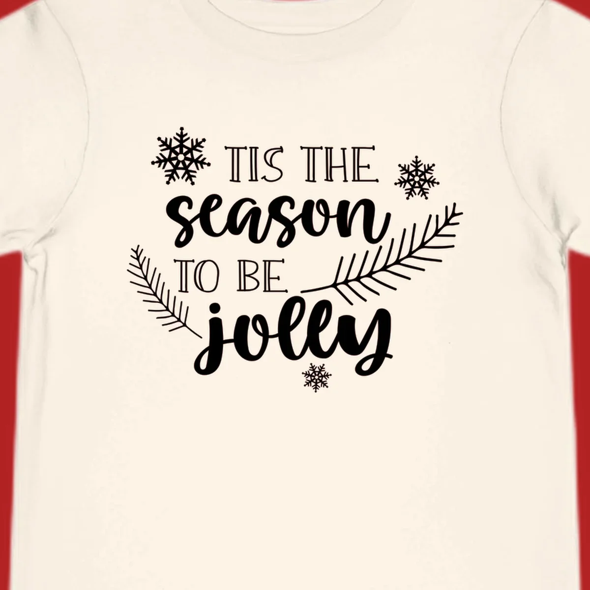 Tis the season to be jolly Christmas design with snowflakes and pine branches.