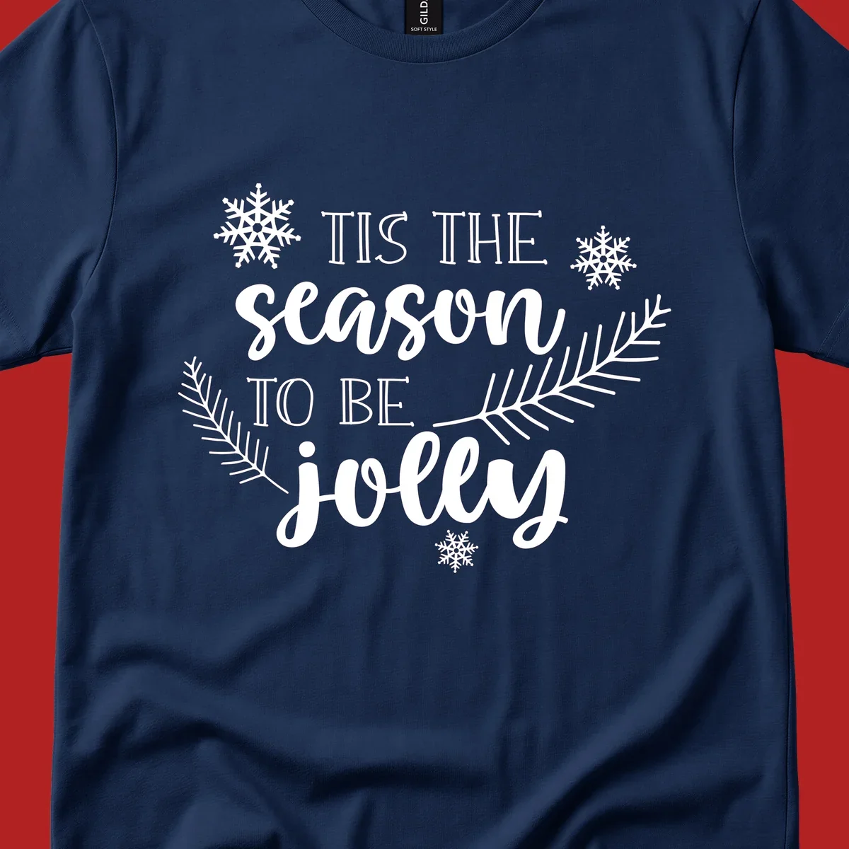Tis the season to be jolly Christmas design with snowflakes and pine branches.