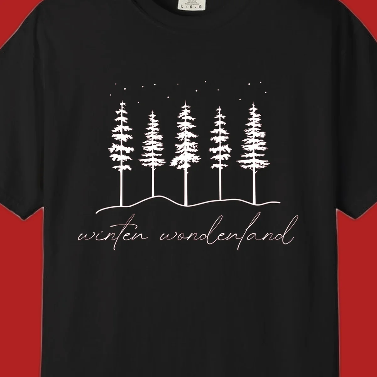 Winter wonderland forest scene with pine trees and stars, text 'winter wonderland'.