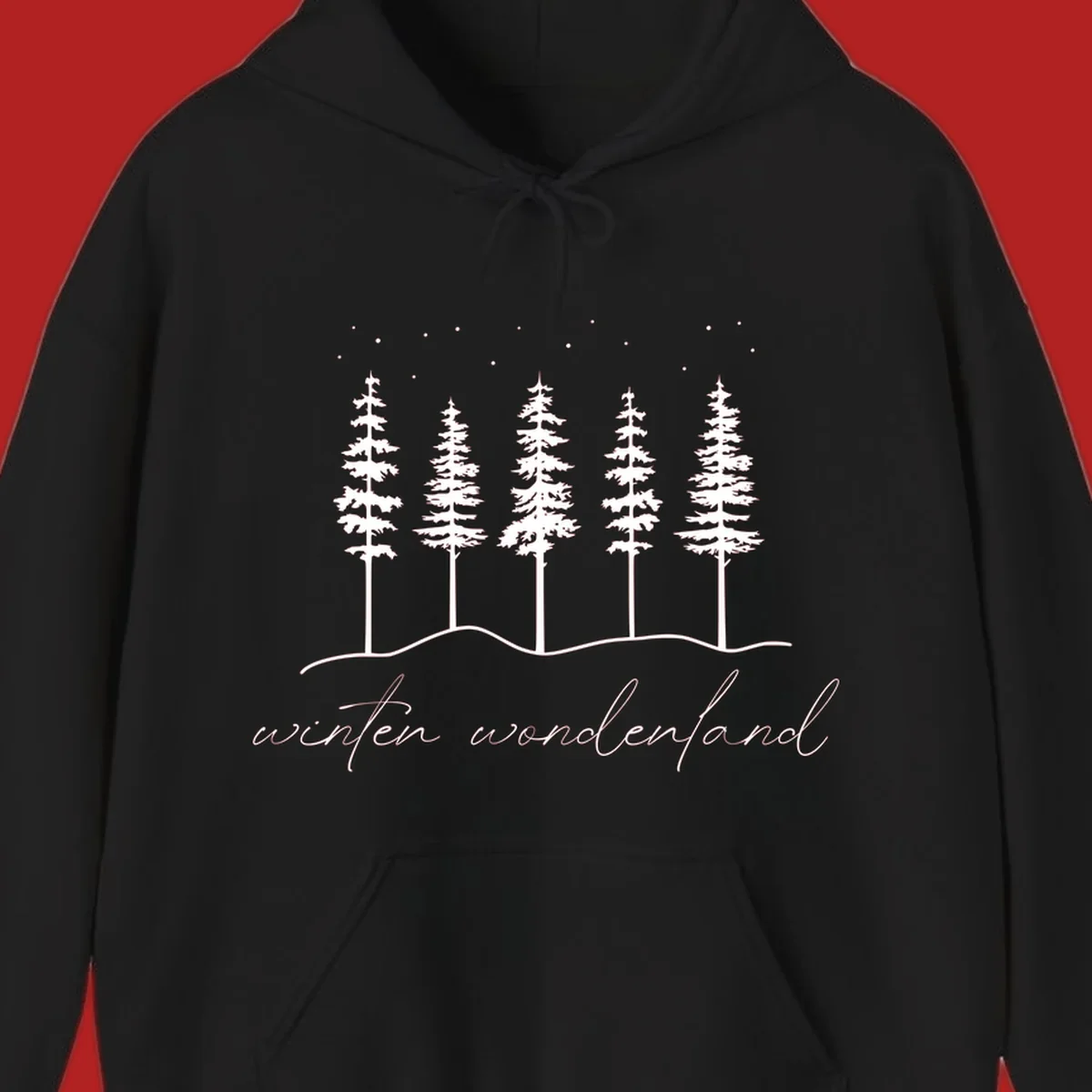Winter wonderland forest scene with pine trees and stars, text 'winter wonderland'.