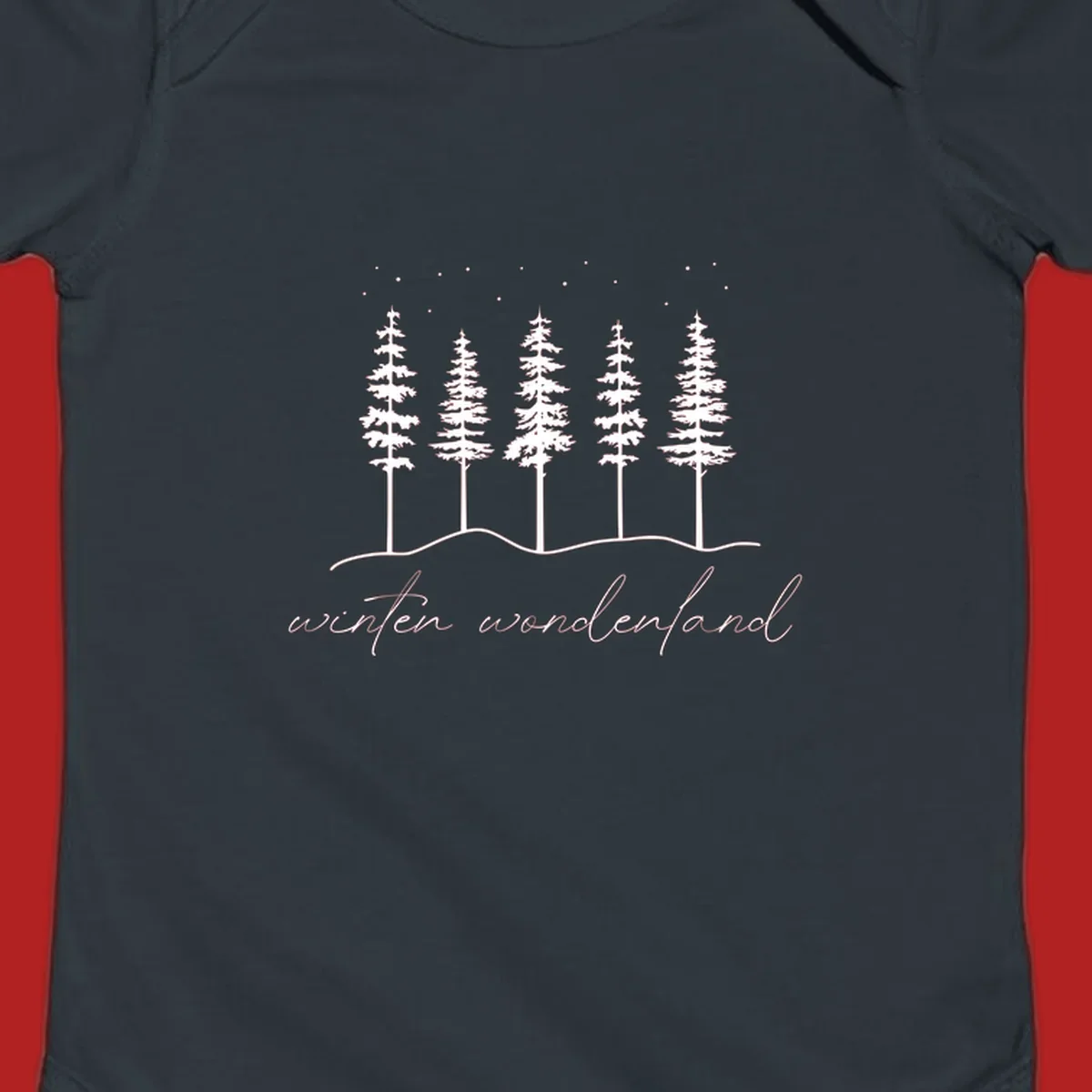 Winter wonderland forest scene with pine trees and stars, text 'winter wonderland'.