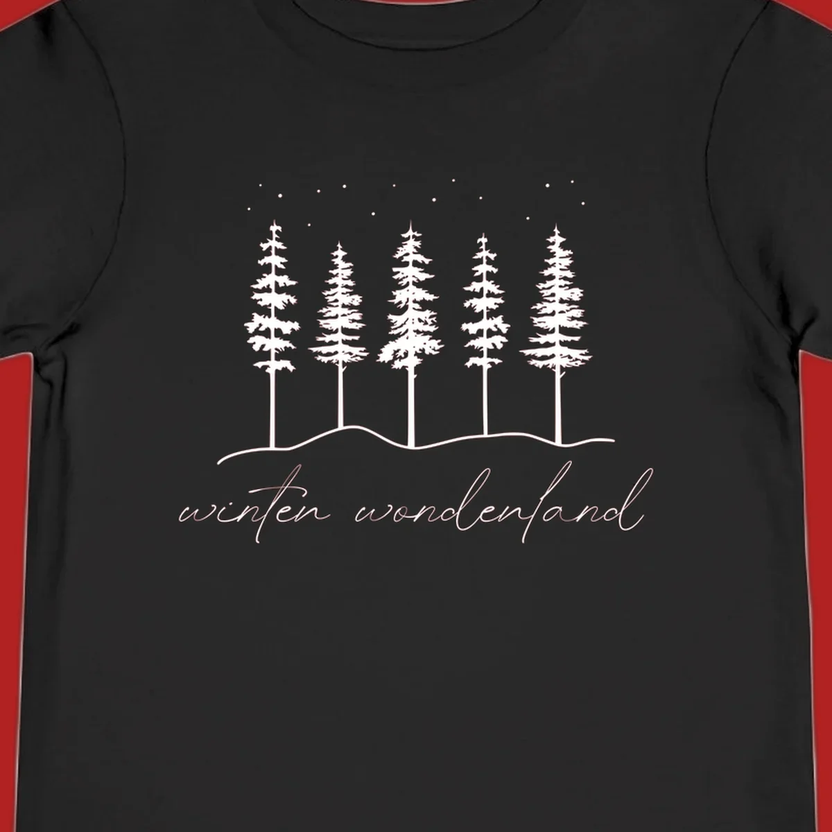 Winter wonderland forest scene with pine trees and stars, text 'winter wonderland'.