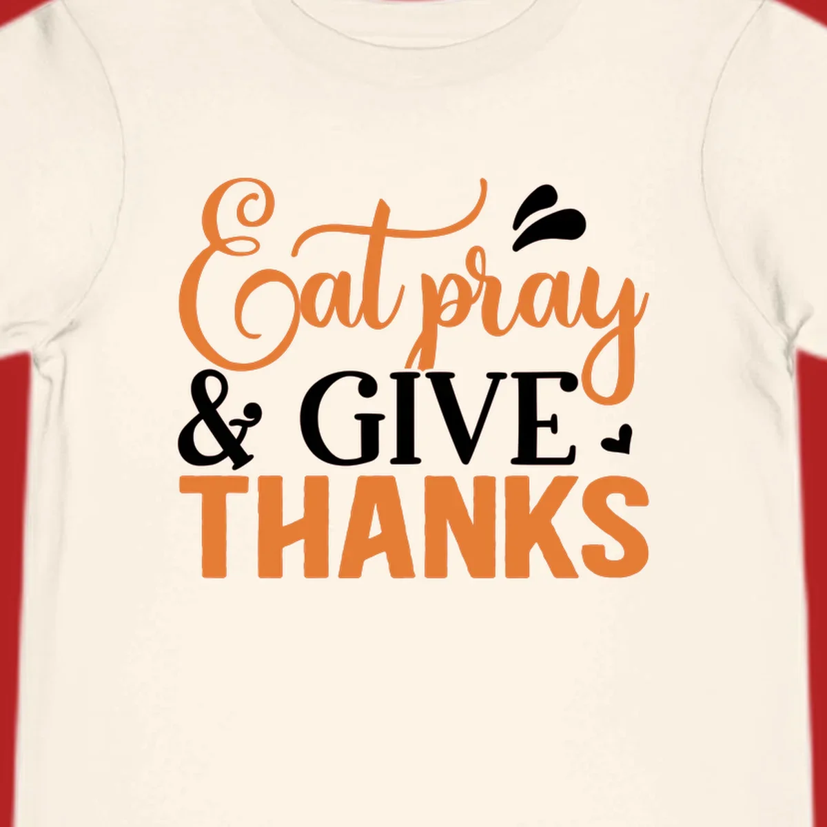 Eat Pray Give Thanks text design with orange, white, and black lettering.
