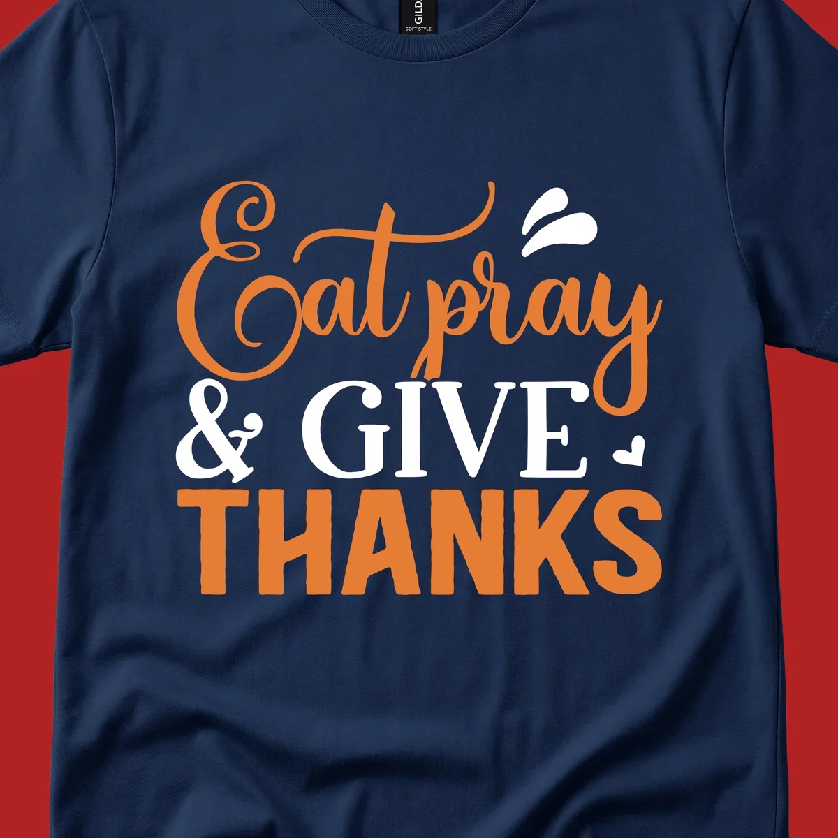 Eat Pray Give Thanks text design with orange, white, and black lettering.