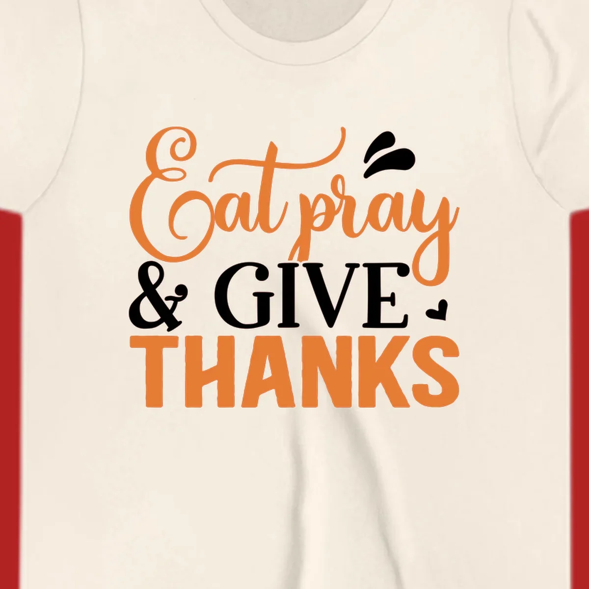 Eat Pray Give Thanks text design with orange, white, and black lettering.
