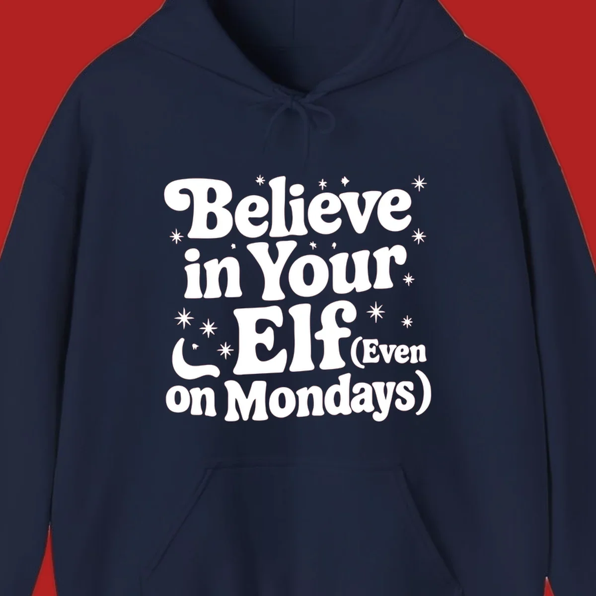 Believe in Your Elf text with stars and sparkles, retro font.