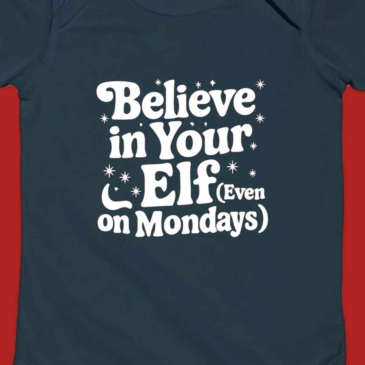 Believe in Your Elf text with stars and sparkles, retro font.