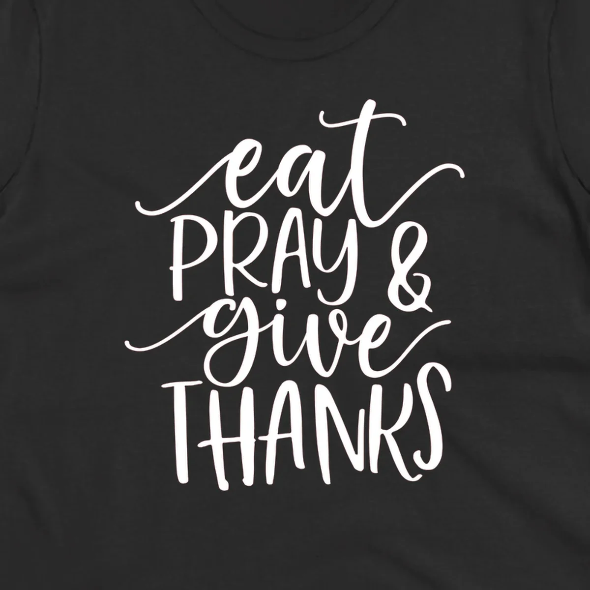 Eat Pray Give Thanks hand-lettered design with white text on a dark background.