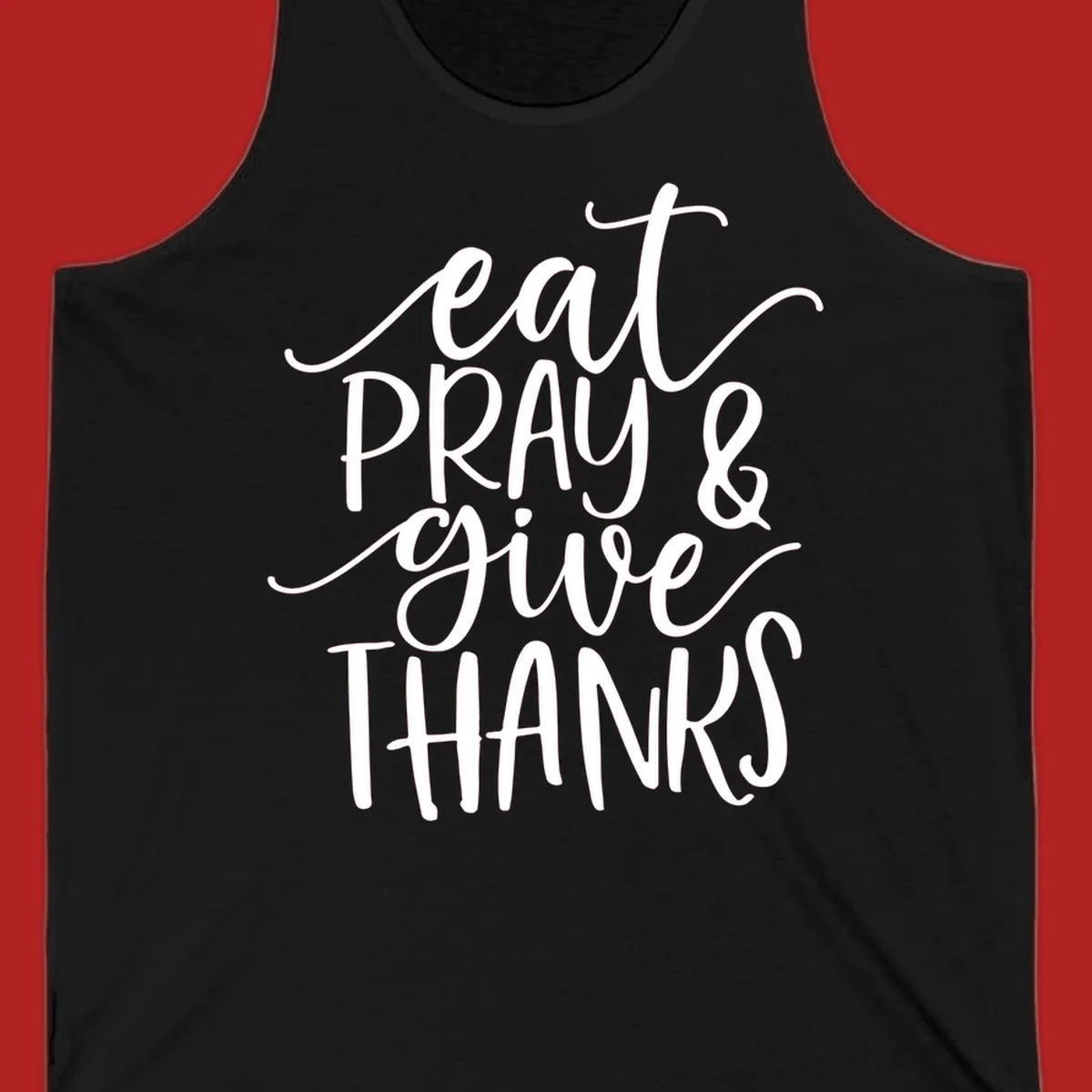 Eat Pray Give Thanks hand-lettered design with white text on a dark background.