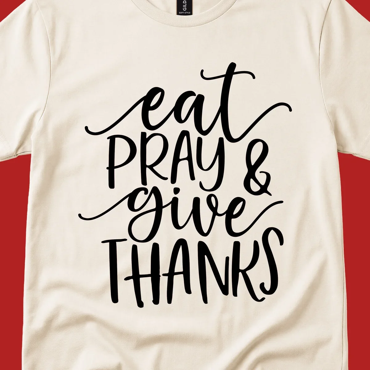 Eat Pray Give Thanks hand-lettered design with white text on a dark background.