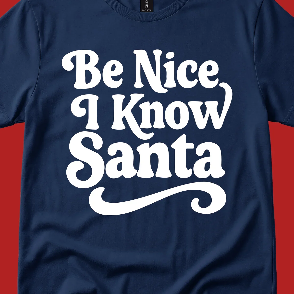 White retro text 'Be Nice I Know Santa' with a flourish, holiday design.