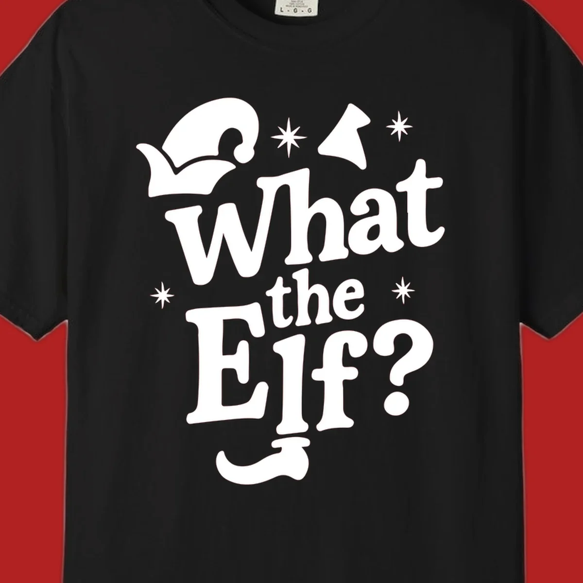 What The Elf holiday phrase design with elf hat and stars.