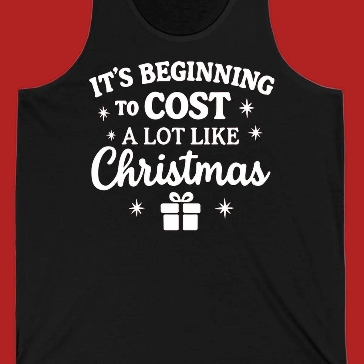 Typography design that says "It's Beginning To Cost A Lot Like Christmas" with stars and a gift box.
