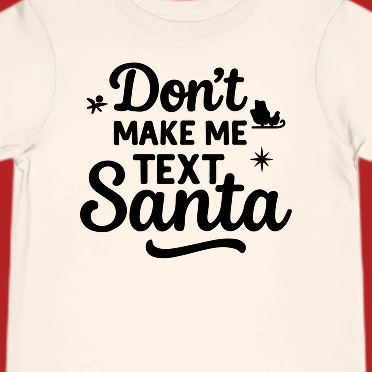 Holiday text design: Don't Make Me Text Santa with Santa in sleigh silhouette.