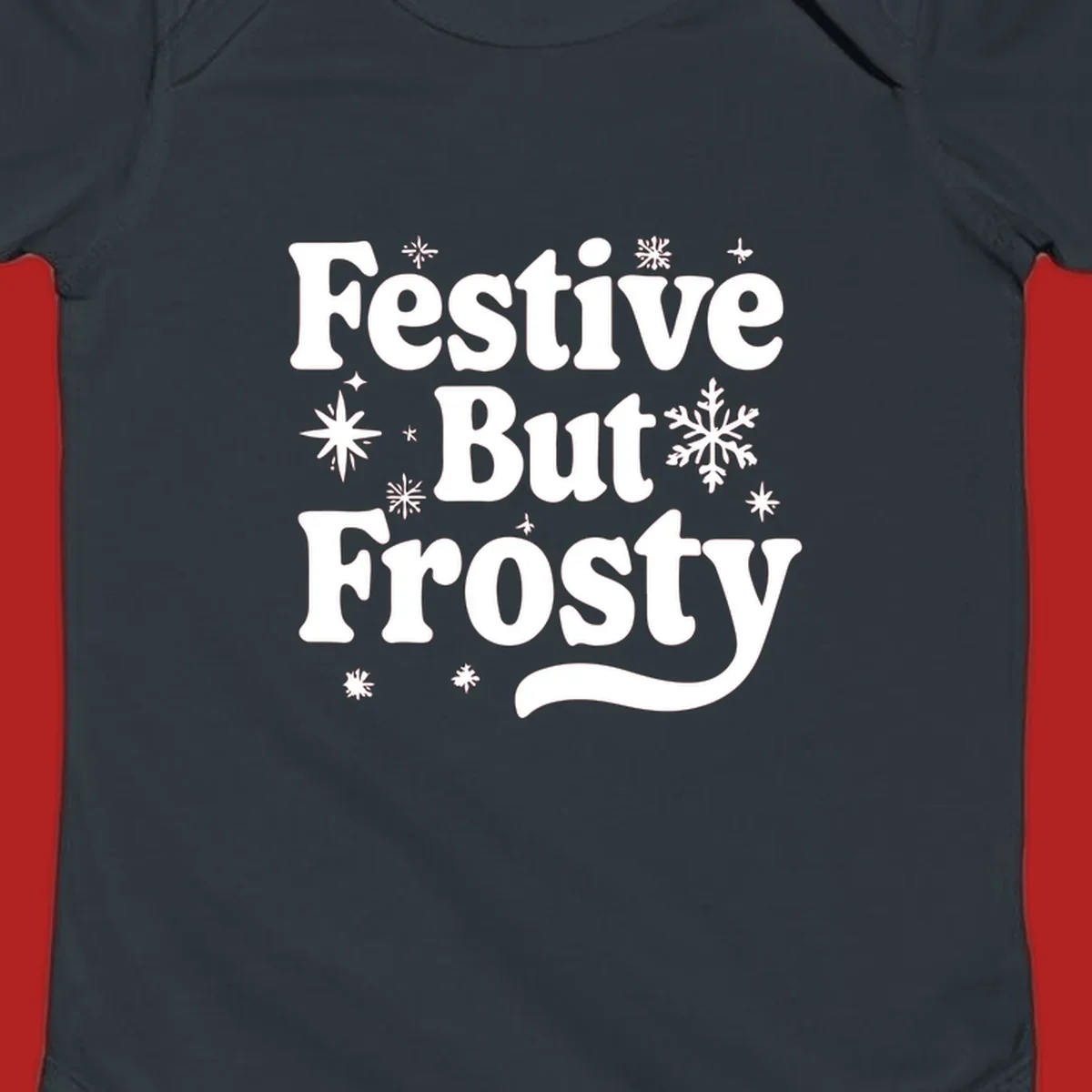 Festive But Frosty text with snowflakes and stars, holiday design.