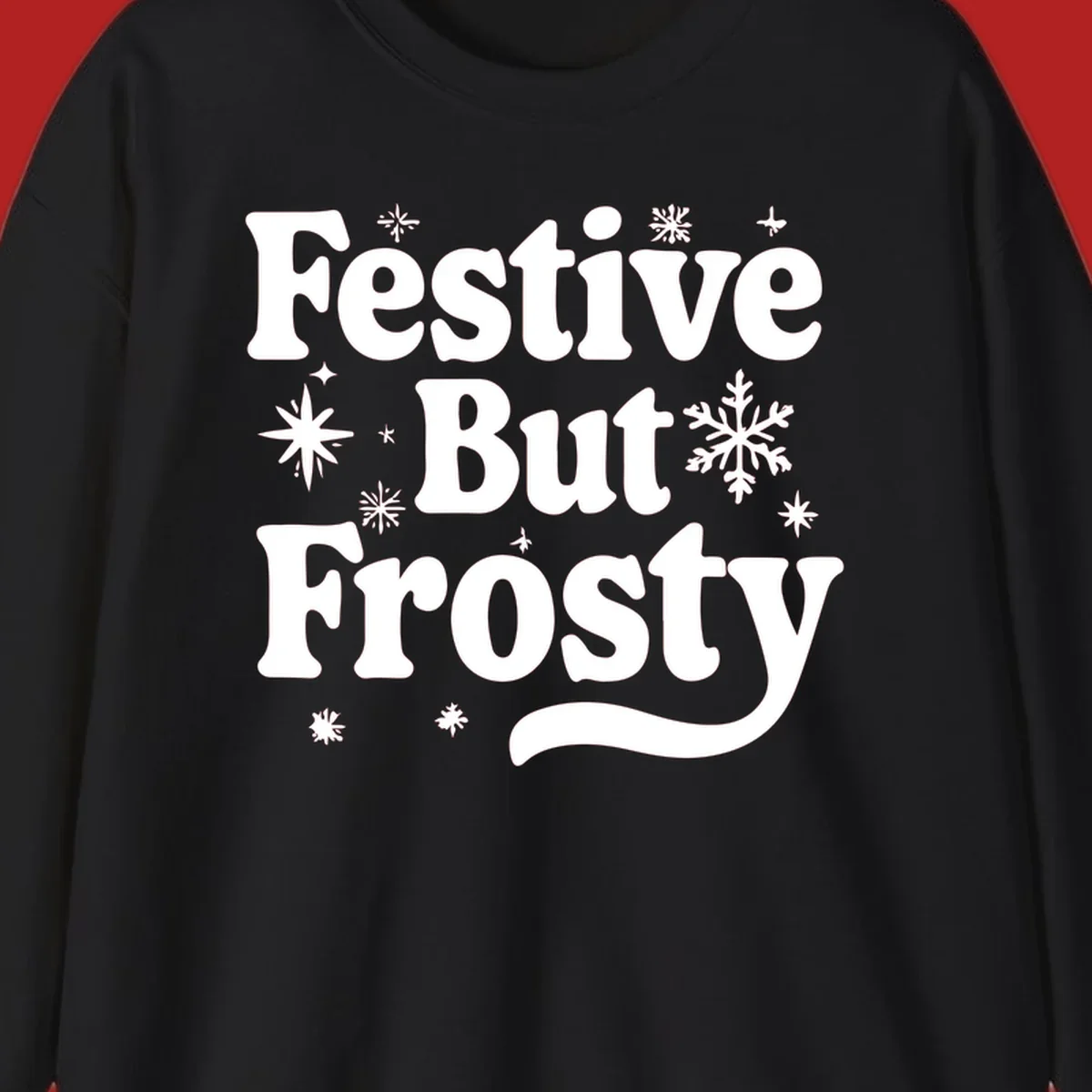 Festive But Frosty text with snowflakes and stars, holiday design.