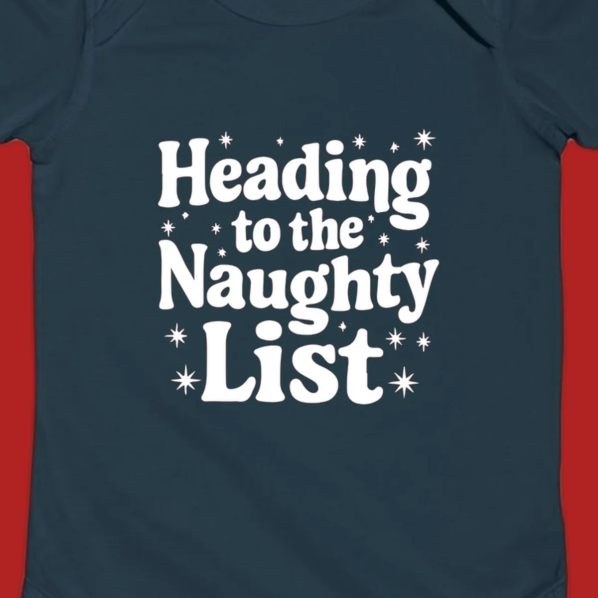 Text design that says "Heading to the Naughty List" with stars, for a naughty list christmas concept.