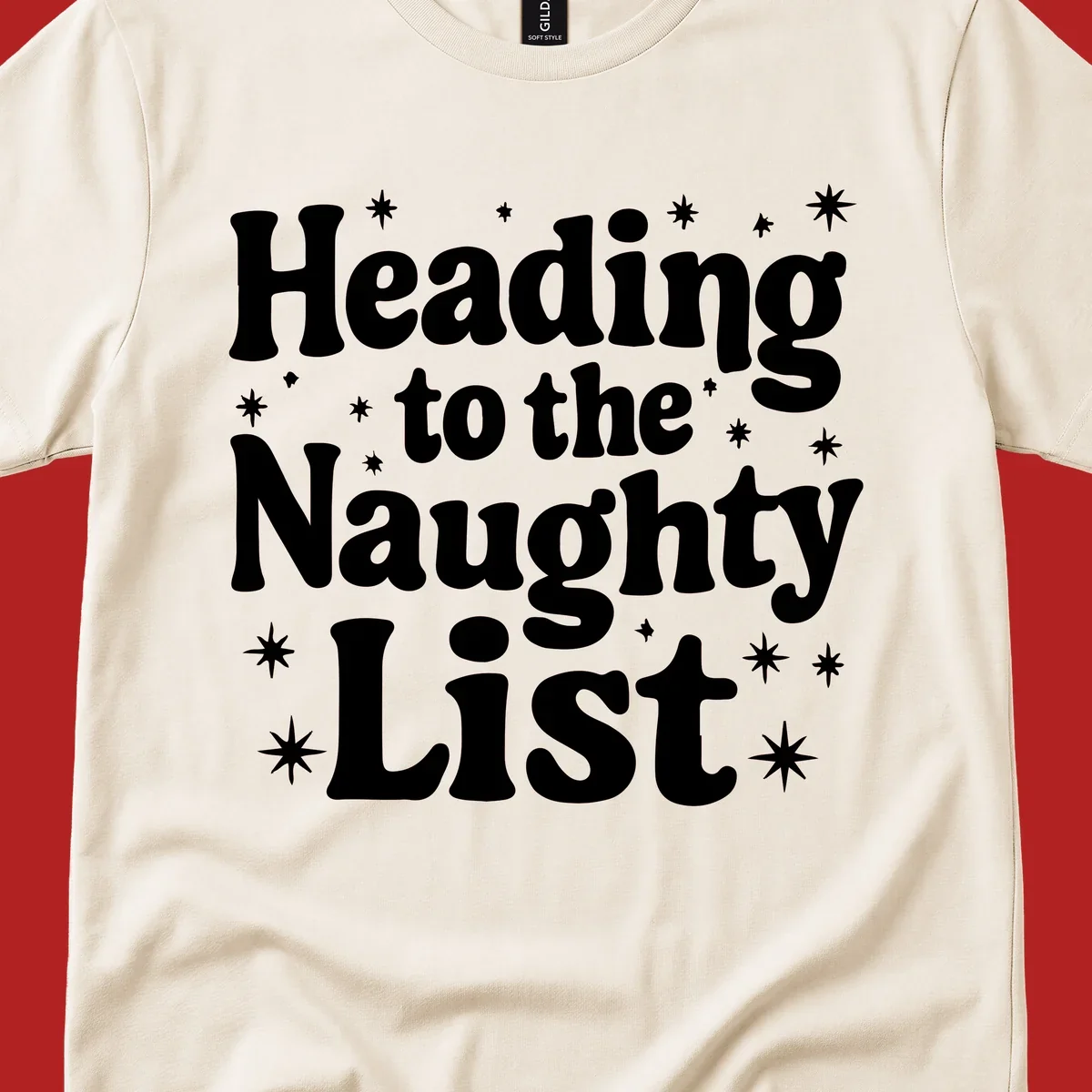 Text design that says "Heading to the Naughty List" with stars, for a naughty list christmas concept.