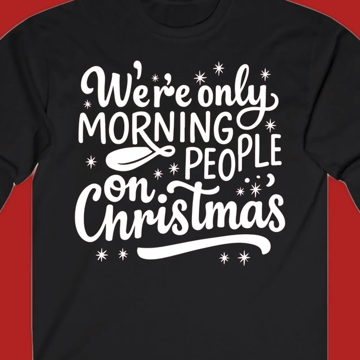 White text that says We're only MORNING PEOPLE on Christmas, with stars and a spoon.