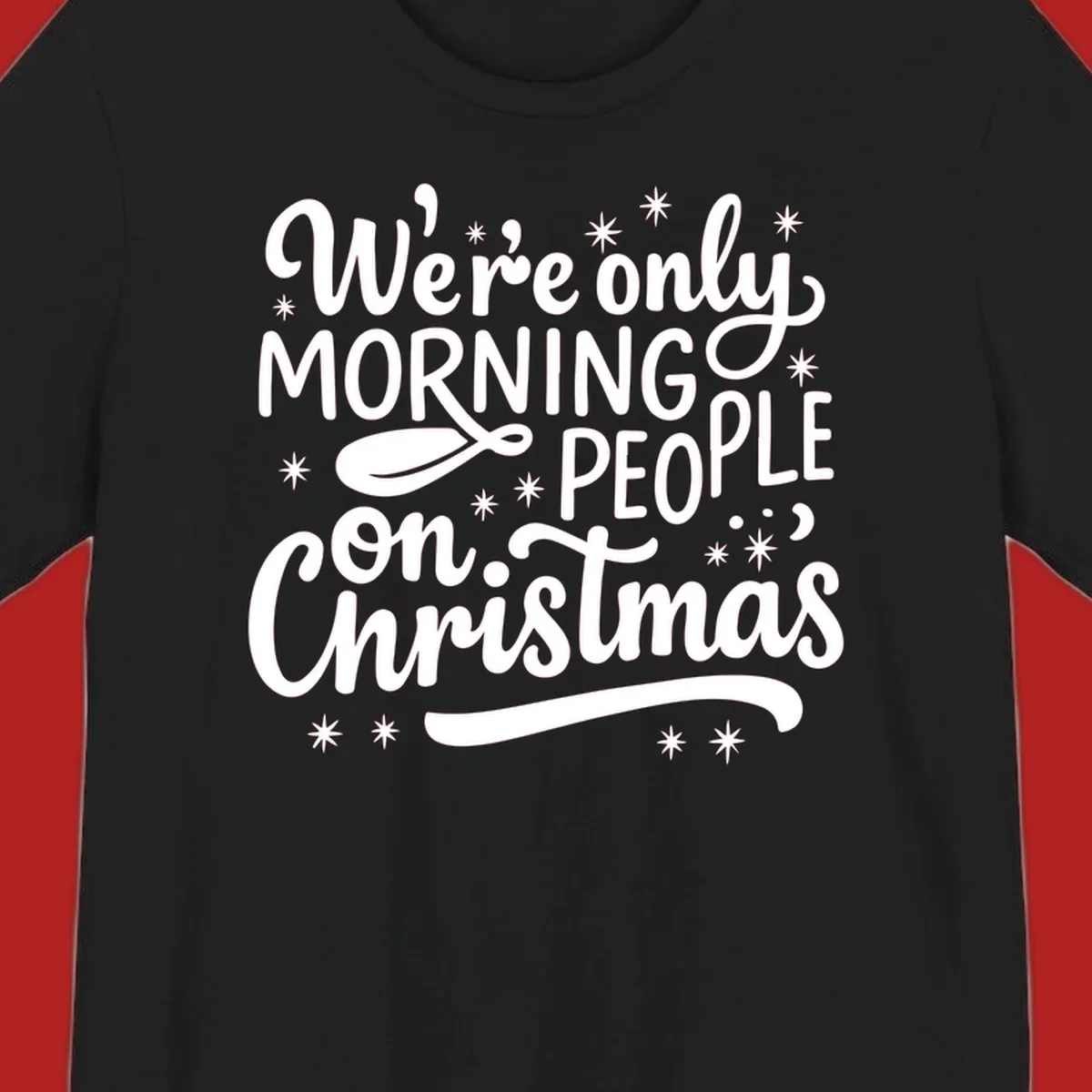 White text that says We're only MORNING PEOPLE on Christmas, with stars and a spoon.