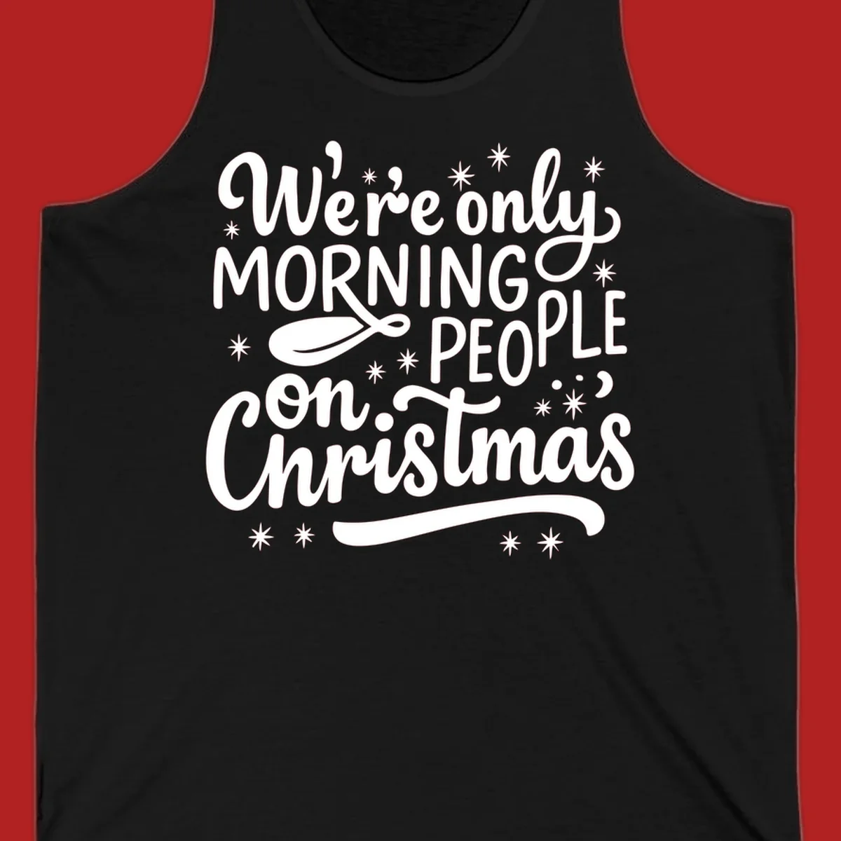White text that says We're only MORNING PEOPLE on Christmas, with stars and a spoon.