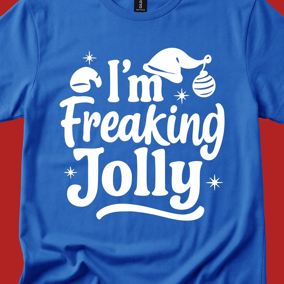 I'm Freaking Jolly Christmas text design with Santa hat and stars.