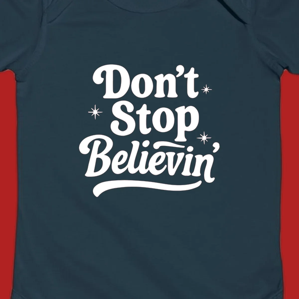 White retro typography 'Don't Stop Believin'' with starbursts on black background.