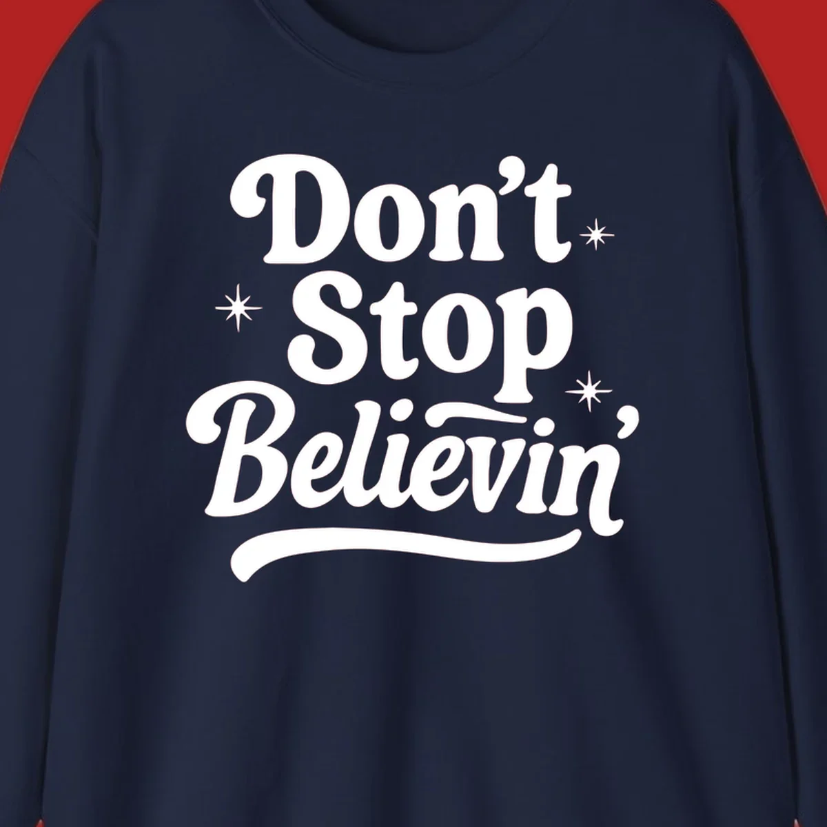 White retro typography 'Don't Stop Believin'' with starbursts on black background.