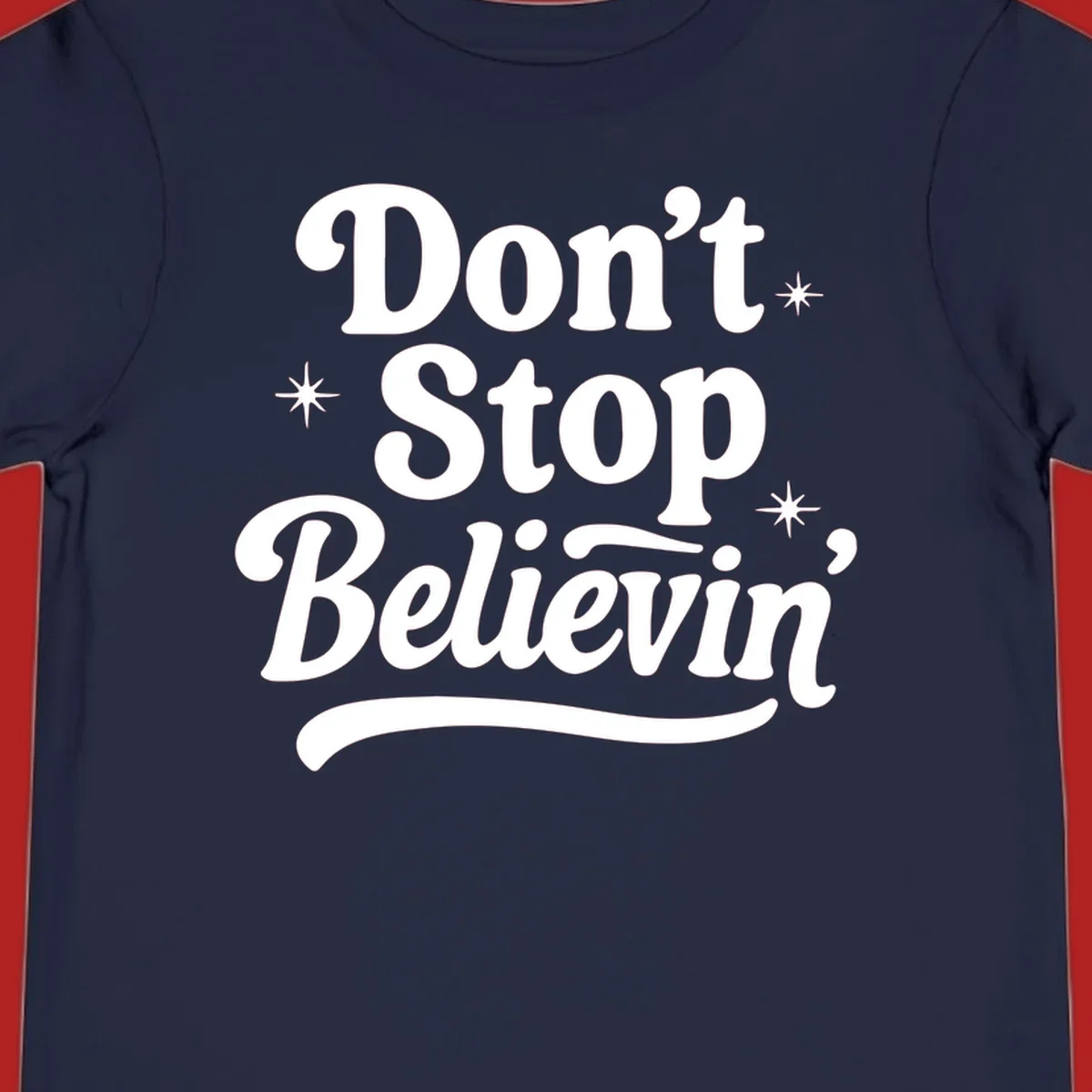 White retro typography 'Don't Stop Believin'' with starbursts on black background.