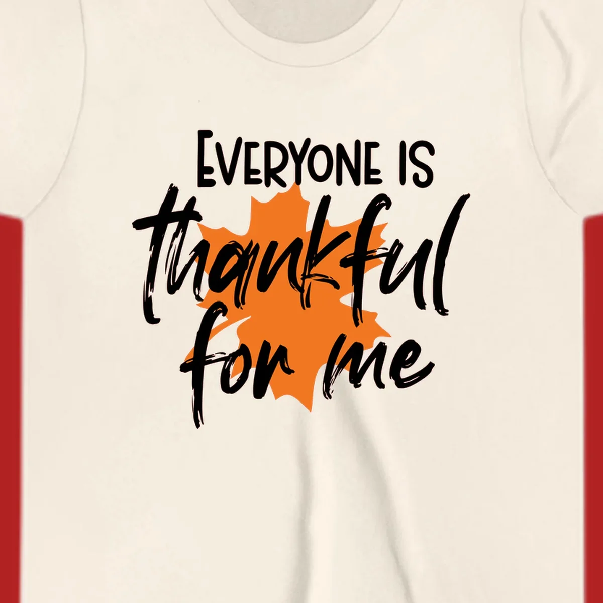 Text that reads "EVERYONE IS thankful for me" over an orange maple leaf. thankful-for-me design.