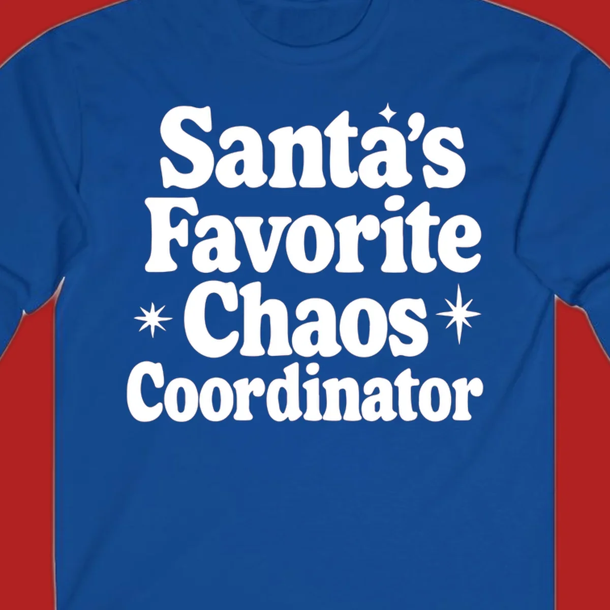 White retro typography reads 'Santa's Favorite Chaos Coordinator' with star accents.