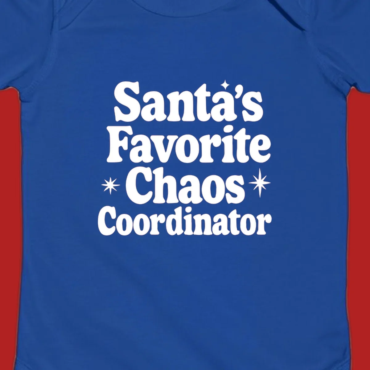 White retro typography reads 'Santa's Favorite Chaos Coordinator' with star accents.