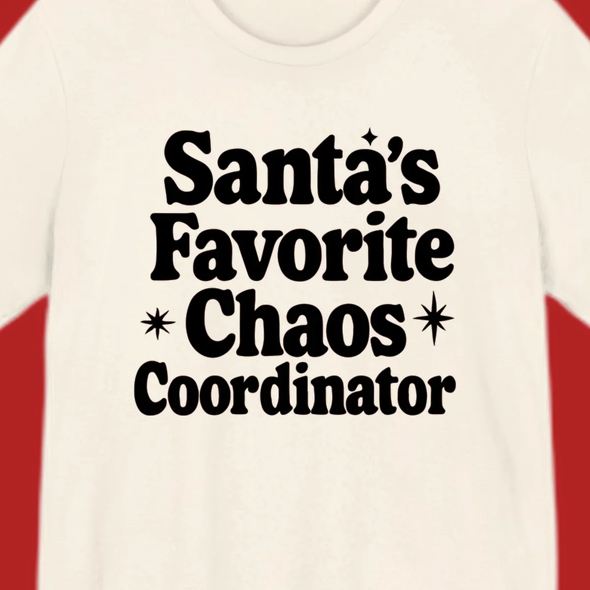 White retro typography reads 'Santa's Favorite Chaos Coordinator' with star accents.